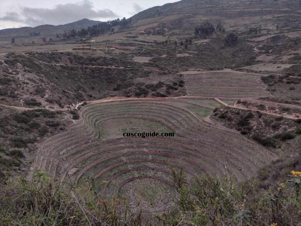 Moray, the ancient Inca agricultural terraces, showcasing concentric circles carved into the earth near Cusco, Peru.
