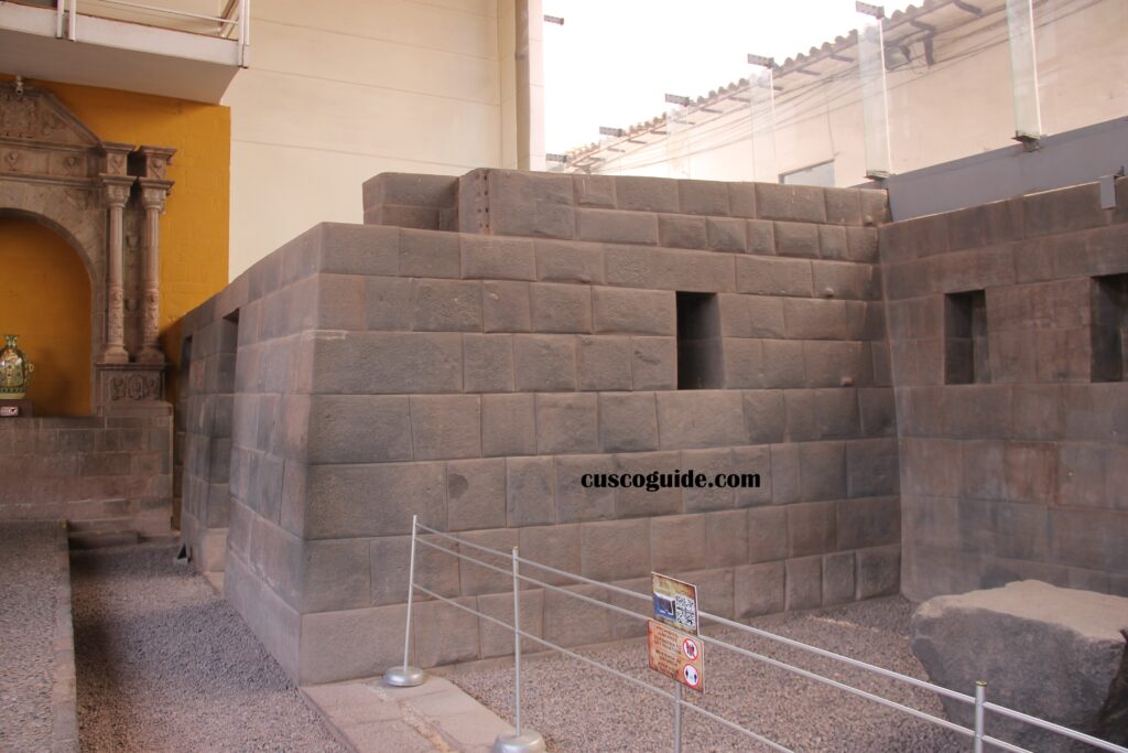 Qorikancha, the Inca Temple of the Sun, showcasing its impressive stone walls and intricate architecture in Cusco, Peru.